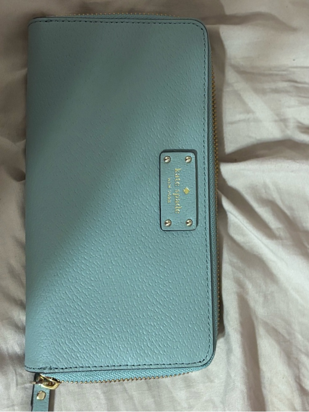 kate spade zip-around wallet in light blue